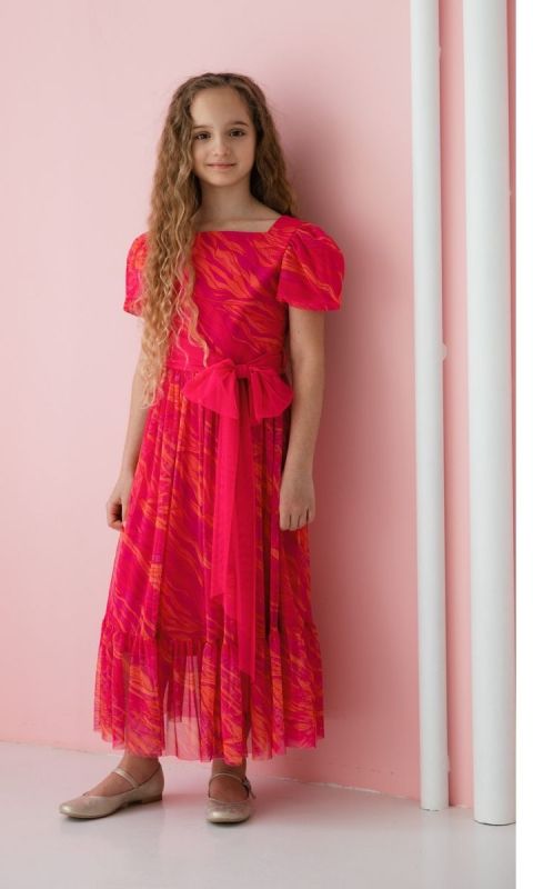 Długa, kolorowa sukienka z kokardą