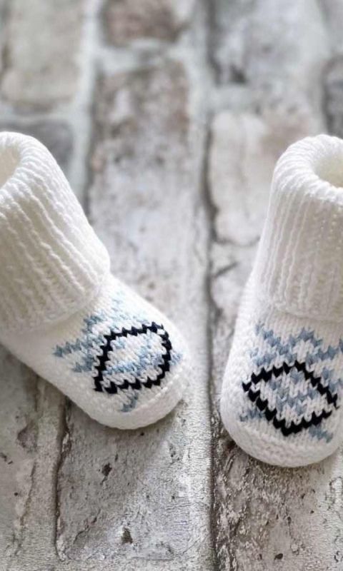 Białe wełniane buciki niemowlęce 100%handmade